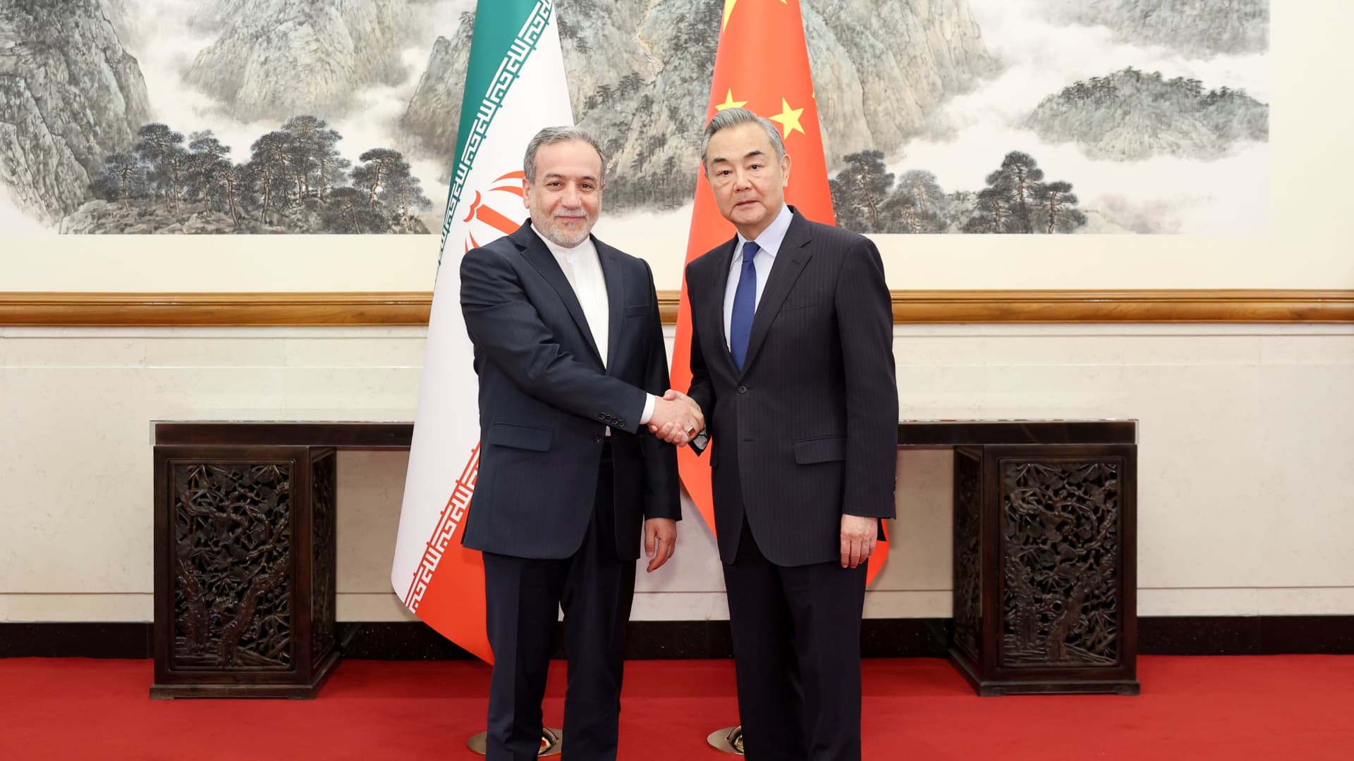 China Hosts Iran's Foreign Minister Ahead of Trump's High-Stakes Visit