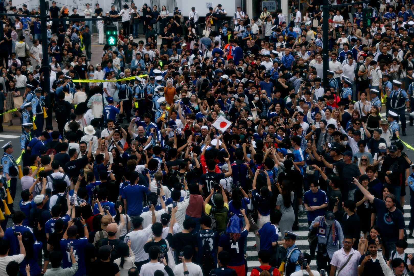 Japan Fans Erupt in Celebration After 4-0 World Cup Victory in Tokyo